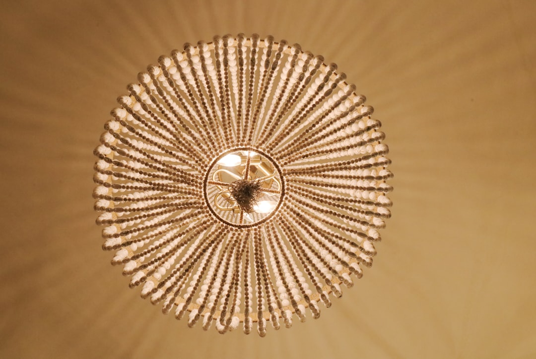 Photo starburst gold pendant light